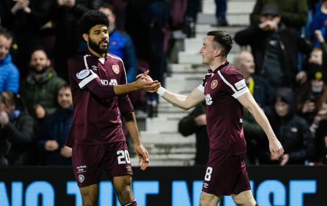 Hearts' Aaron McEneff, left, celebrates with Ellis Simms after making it 3-2 against St Mirren.