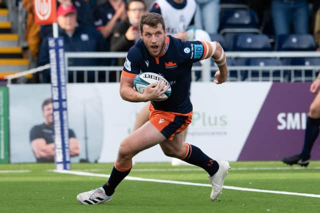 Mark Bennett scores Edinburgh's second try in their United Rugby Championship opener against Scarlets. Picture: Ross Parker/SNS