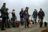 Members of a shooting party prepare to mark the Glorious Twelfth, the annual start of the grouse shooting season on an estate in the Angus Glens (Photo by Jeff J Mitchell/Getty Images)