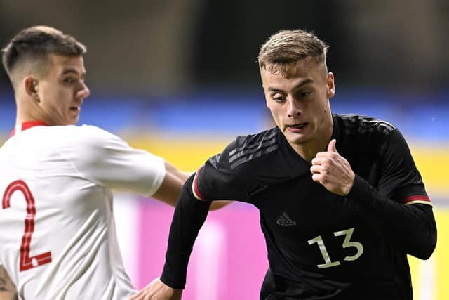 Mateusz Zukowski, left, has been linked with a move to Rangers.