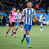 Kilmarnock's Callum Hendry celebrates making it 3-0 during a Cinch Championship match between Kilmarnock and Queen of the South. Killie later added another through Chris Burke. (Photo by Sammy Turner / SNS Group)