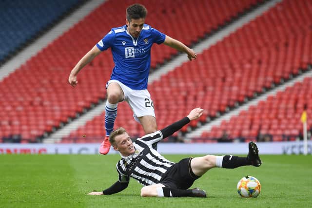 St Johnstone's Callum Booth (left) is tackled by St Mirren's Jake Doyle-Hayes during the Perth club's Scottish Cup semi-final victory over St Mirren that now sees only old club Hibs stand in the McDiarmid Park side's way of an historic double. (Photo by Craig Foy / SNS Group)