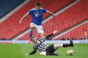 St Johnstone's Callum Booth (left) is tackled by St Mirren's Jake Doyle-Hayes  during the Perth club's Scottish Cup semi-final victory over St Mirren that now sees only old club Hibs stand in the McDiarmid Park side's way of an historic  double. (Photo by Craig Foy / SNS Group)