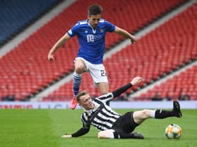 St Johnstone's Callum Booth (left) is tackled by St Mirren's Jake Doyle-Hayes  during the Perth club's Scottish Cup semi-final victory over St Mirren that now sees only old club Hibs stand in the McDiarmid Park side's way of an historic  double. (Photo by Craig Foy / SNS Group)