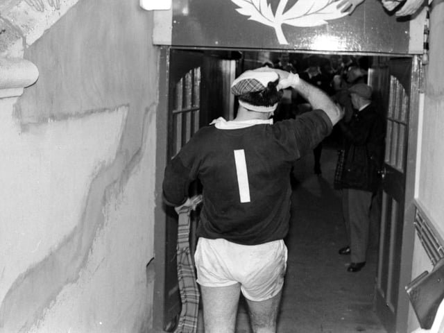 David Sole walks off the pitch in triumph after the game.