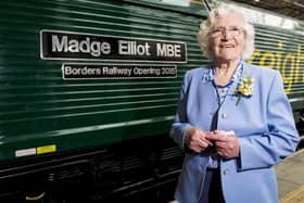 Madge Elliot MBE pictured at the carriage named after her