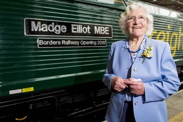 Madge Elliot MBE pictured at the carriage named after her