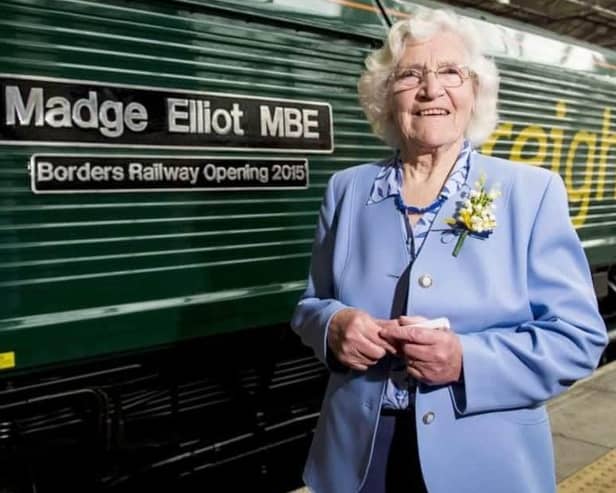 Madge Elliot MBE pictured at the carriage named after her