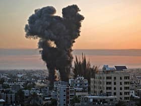 Black smoke billows after a series of Israeli airstrikes targeted Khan Yunis in the southern Gaza strip, early on May 12 picture: YOUSSEF MASSOUD/AFP via Getty Images