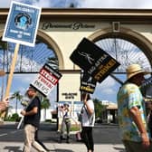 Striking WGA (Writers Guild of America) members picket with striking SAG-AFTRA members outside Paramount Studios earlier this month in Los Angeles, California.