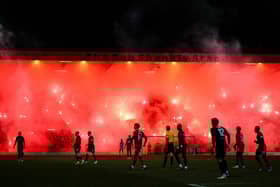 Rangers fans light up the Bob Shankly Stand with pyro during the match against Dundee at Dens Park.  (Photo by Ross Parker / SNS Group)