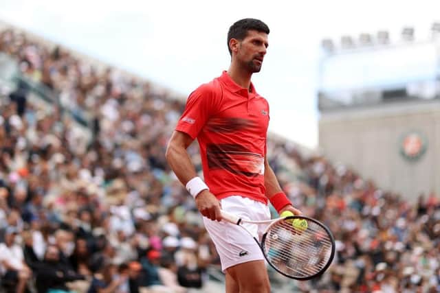 Novak Djokovic of Serbia looks on against Diego Schwartzman of Argentina during the Men's Singles Fourth Round match on Day 8 of The 2022 French Open at Roland Garros on May 29, 2022 in Paris, France. (Photo by Ryan Pierse/Getty Images)