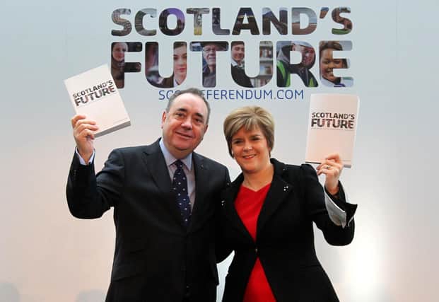 Alex Salmond and Nicola Sturgeon at the launch of the White Paper on independence in November 2013, ahead of the independence referendum the following year (Picture: Andrew Milligan/PA Wire)