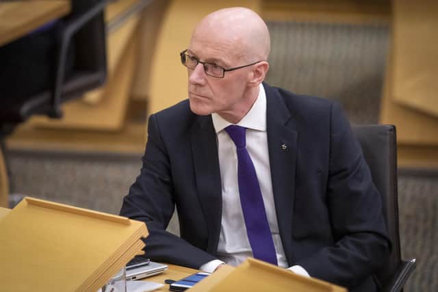 Deputy First Minister John Swinney answered journalists questions on the GERS figures