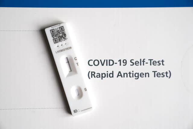 A Covid-19 rapid antigen test (lateral flow self test) showing a negative result (as indicated by the mark corresponding with the 'C').