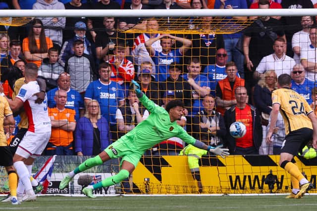 Rangers Scott Arfield (not in frame) flicks his header past Livingston's Shamal George to make it 1-1 and flip the encounter eventually won 2-1 by Giovanni van Bronckhorst's men. (Photo by Craig Williamson / SNS Group)