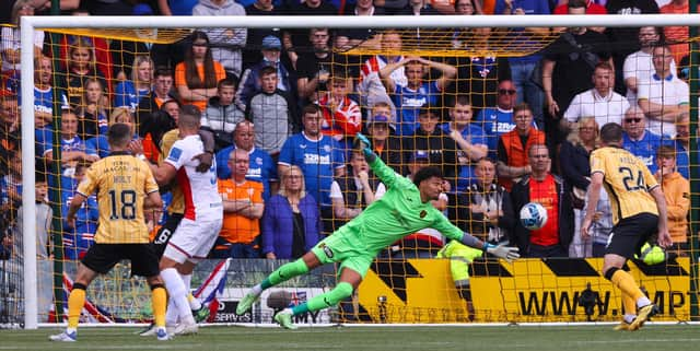 Rangers Scott Arfield (not in frame) flicks his header past Livingston's Shamal George to make it 1-1 and flip the encounter eventually won 2-1 by Giovanni van Bronckhorst's men. (Photo by Craig Williamson / SNS Group)