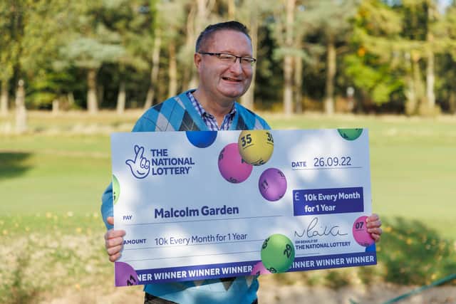 Malcolm Garden with his winnings.
