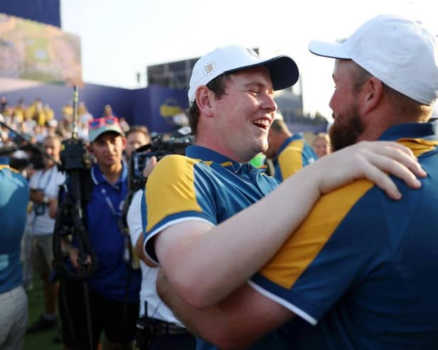 Bob MacIntyre and Shane Lowry celebrate after Europe's win in the Ryder Cup at Marco Simone Golf Club in Rome at the end of October. Picture: Naomi Baker/Getty Images.