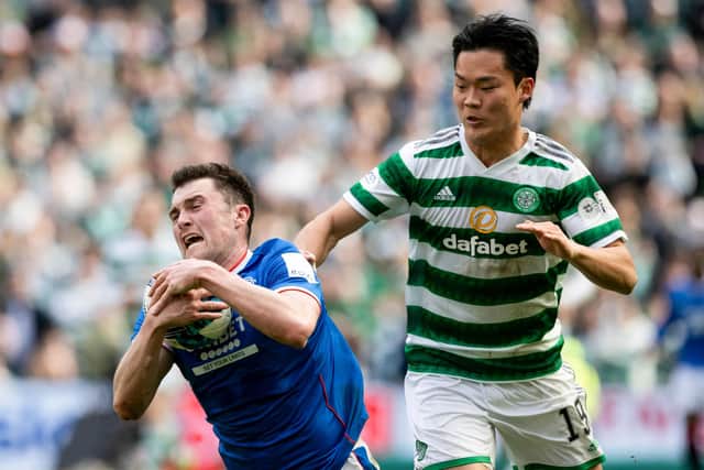 Celtic's Hyeon-gyu Oh fouls Rangers defender John Souttar after coming off the bench during last Saturday's Old Firm encounter.  (Photo by Craig Williamson / SNS Group)