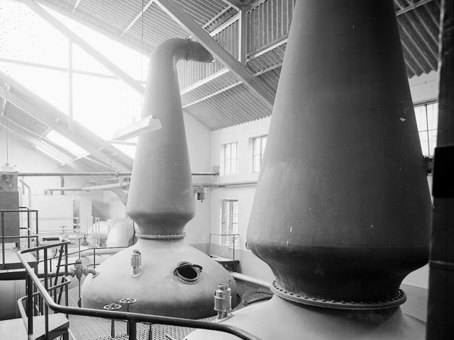 The still room at the Jura Distillery which had one of the largest wash stills in Scotland - with a capacity of 7000 gallons.