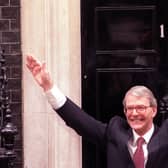 Prime Minister John Major waves to supporters in Downing Street after his shock victory in the 1992 general election (Picture: Jim James/PA)