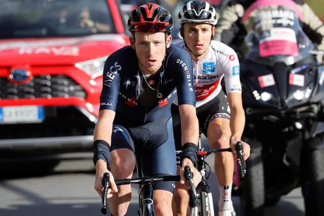 Team Ineos rider Tao Geoghegan Hart, left, and Team Sunweb's Jai Hindley ride uphill at Passo dello Stelvio during the 18th stage of the Giro d'Italia 2020.