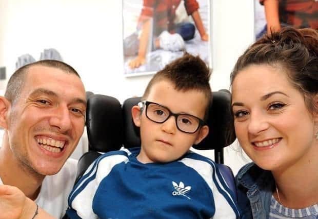 Charlene and Innes Londra from Kirkcaldy with their son Gino. Pic: Fife Photo Agency
