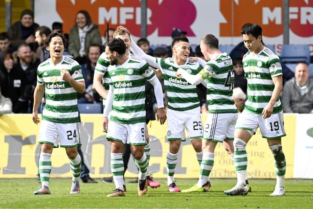 Celtic celebrate Alexandro Bernabei's first goal for the club, which helped them overcome Ross County 2-0 in Dingwall.