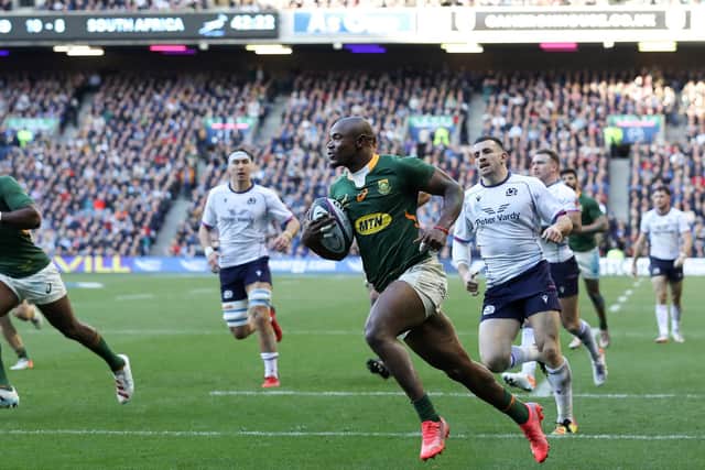 Makazole Mapimpi of South Africa goes over to score their side's second try against Scotland. (Photo by Ian MacNicol/Getty Images)