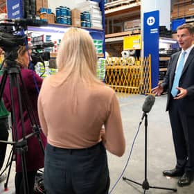 Chancellor Jeremy Hunt paid a visit to a builders warehouse in London yesterday (Picture: Kirsty Wigglesworth/pool/AFP via Getty Images)
