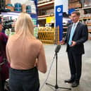 Chancellor Jeremy Hunt paid a visit to a builders warehouse in London yesterday (Picture: Kirsty Wigglesworth/pool/AFP via Getty Images)