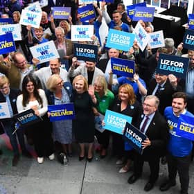 Contender to become the country's next Prime minister and leader of the Conservative party, foreign secretary Liz Truss, is greeted by supporters as she arrives to attend a Conservative Party hustings event in Perth. Picture: Andy Buchanan/AFP via Getty Images