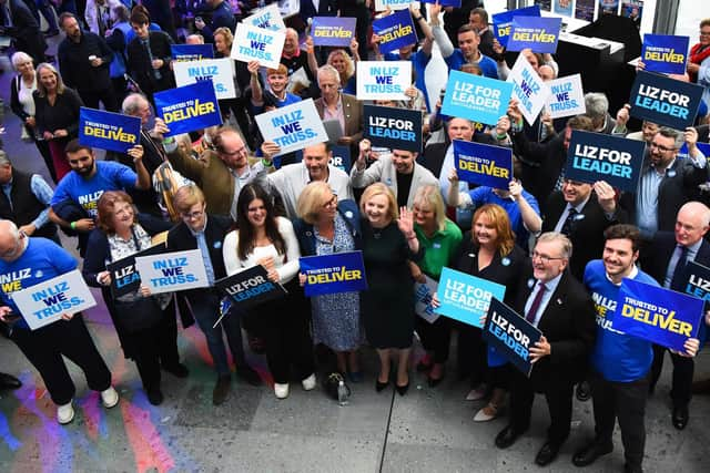 Contender to become the country's next Prime minister and leader of the Conservative party, foreign secretary Liz Truss, is greeted by supporters as she arrives to attend a Conservative Party hustings event in Perth. Picture: Andy Buchanan/AFP via Getty Images