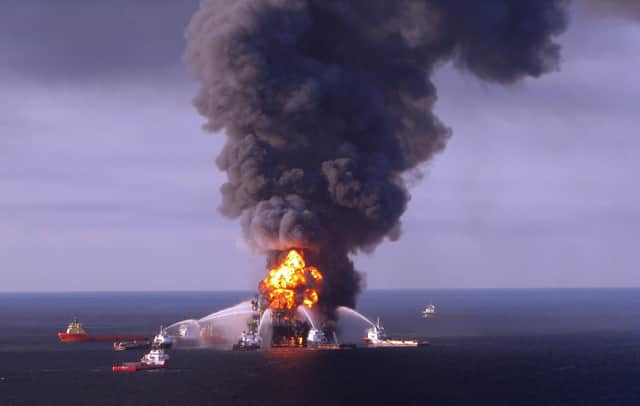 Fire boats battle the blazing remnants of the oil rig Deepwater Horizon in April 2010 (Picture: US Coast Guard/AFP via Getty Images)
