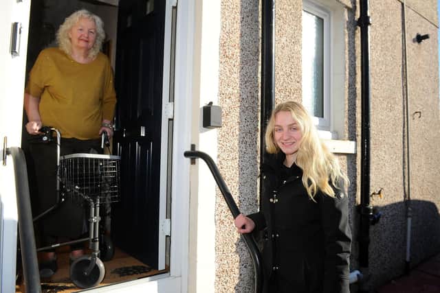 Patricia Stewart (72) meets her saviour Hermes delivery worker Karolina Domska (22) who was there to help her when she fell in the snow and was abandoned  by a postman