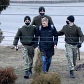 Law enforcement officers detain a man in Minsk, last year during protests against the Belarusian government. More than 1,000 people are believed to be political prisoners in the country.