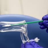 The speculum and soft brush they use for the smear test
