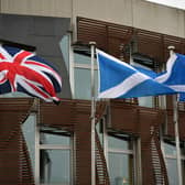 The Scottish Saltire flies alongside the Union Jack and the European Union flags. Picture: Jeff J Mitchell/Getty Images