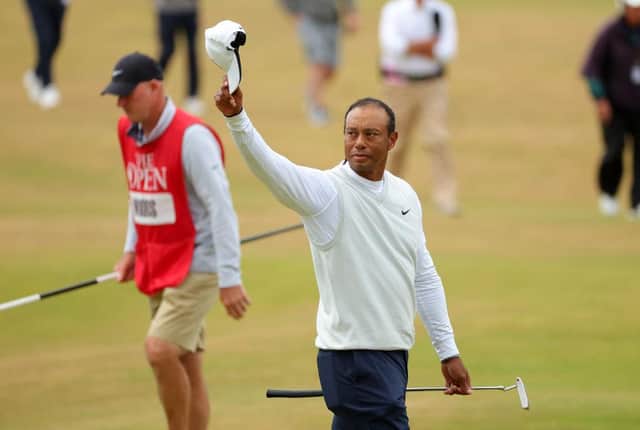 Tiger Woods acknowledges the crowd on the 18th green at St Andrews after missing the cut in the 150th Open in July. Picture: Kevin C. Cox/Getty Images.