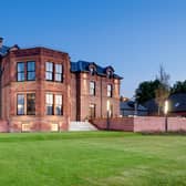 The distinctive red sandstone Douglas Hotel main building on Arran offers 21 bedrooms, along with a 50-cover restaurant, a bar and a large outdoor terrace.