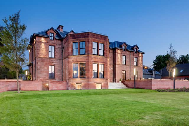 The distinctive red sandstone Douglas Hotel main building on Arran offers 21 bedrooms, along with a 50-cover restaurant, a bar and a large outdoor terrace.