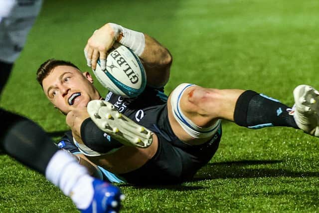 Glasgow Warriors No 8 Jack Dempsey celebrates his first half try against Dragons at Scotstoun. (Photo by Craig Williamson / SNS Group)