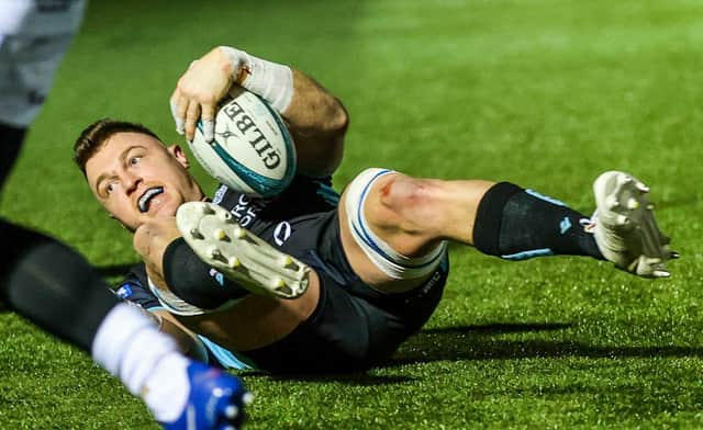 Glasgow Warriors No 8 Jack Dempsey celebrates his first half try against Dragons at Scotstoun. (Photo by Craig Williamson / SNS Group)