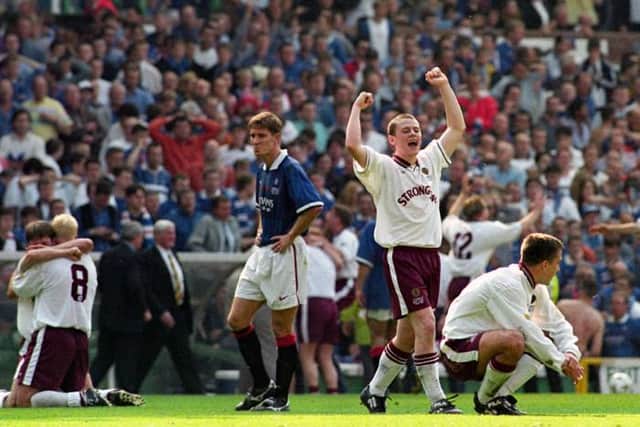 Gary Naysmith raises his hands in celebration at the full-time whistle after Hearts' 2-1 win over Rangers in the Scottish Cup Final at Celtic Park in 1998. (Photo by SNS Group).
