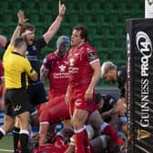 Glasgow's Rob Harley (L) celebrates Ryan Wilson's try against Scarlets. Picture: Ross Parker / SNS