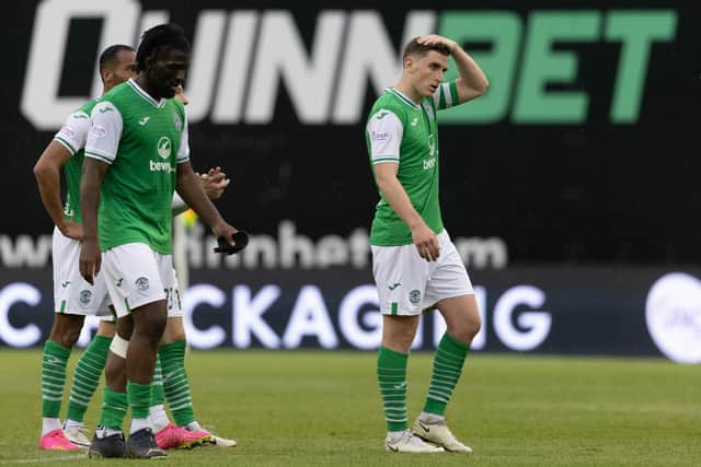 Hibs' Paul Hanlon and Rocky Bushiri look dejected at full time