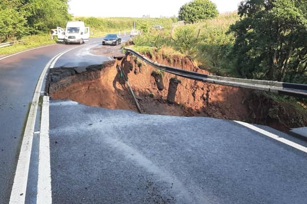 A section of a major road linking Edinburgh with the Northeast of England has collapsed during dramatic thunderstorms last night.