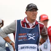 Gemma Dryburgh sizes up a shot with caddie Paul Heselden in the first round of the Trust Golf Women's Scottish Open at Dundonald Links.