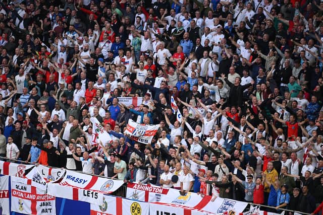 England fans sing their national anthem prior to kick-off ahead of the Euro 2024 group stage match against Serbia at Arena AufSchalke in Gelsenkirchen, Germany.   (Photo by Matthias Hangst/Getty Images)
